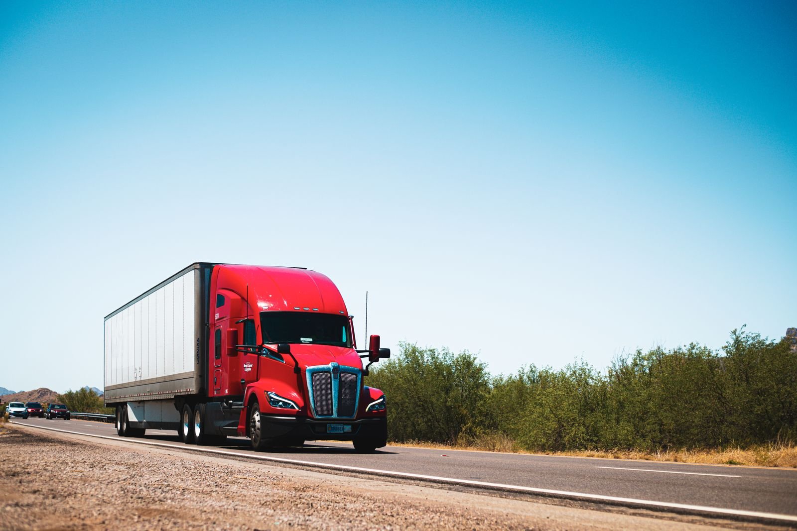 Semi truck with trailer on the highway